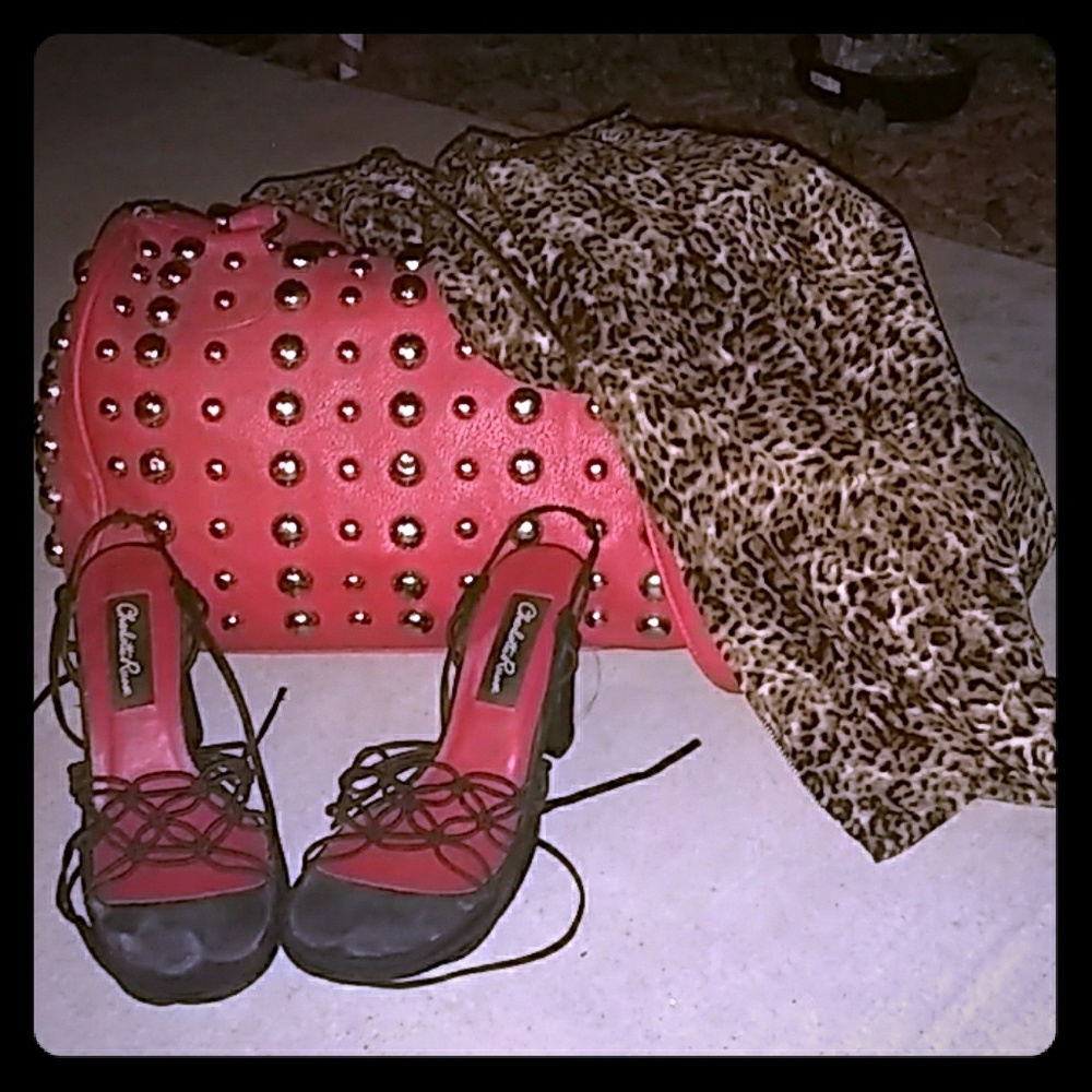 A set of three red hand bag cheetah jacket heels